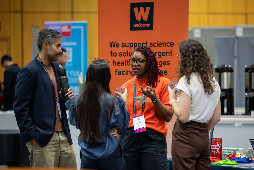 A small group of delegates in conversation