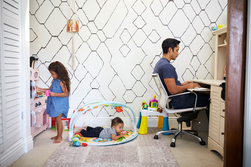 Man working from home with children