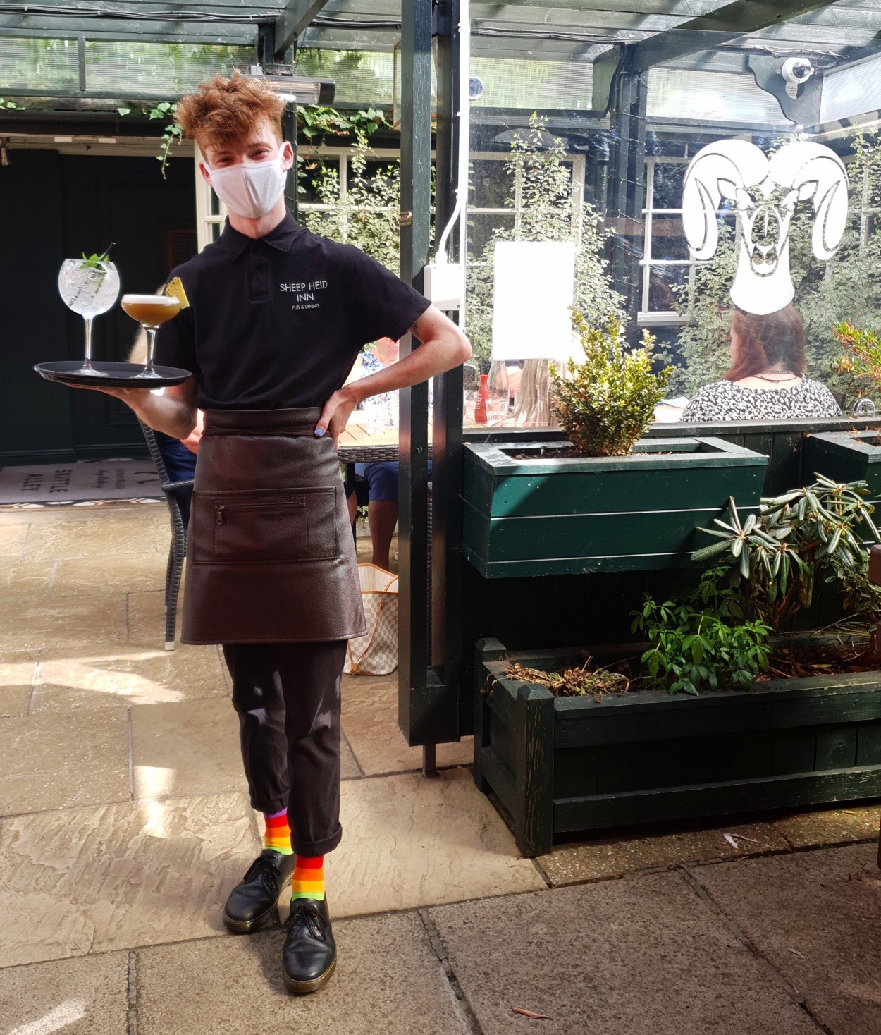 A server at the Sheep Heid Inn